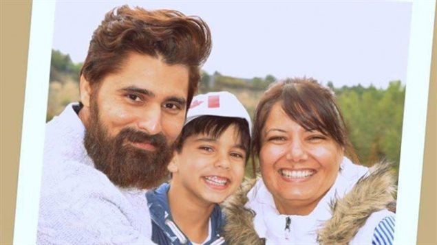 Karanpal Bhangu, 35, was killed in December 2015 while working at a convenience store in Edmonton. He is pictured with his son and wife in this image from gofundme.com.