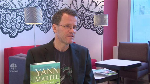 Award winning Canadian novelist Yann Martel with his latest work, *The High Mountains of Portugal*