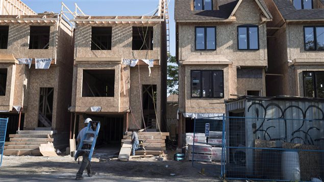  Houses are shown under construction in Toronto on Friday, June 26, 2015. 