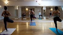 Hot yoga class underway at Iam Yoga in Toronto on Dec. 17, 2014. 