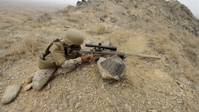 A member of the Saudi forces on the border with Yemen aiming what appears to be a PGW *Timberwolf .338* sniper rifle.