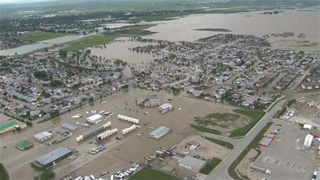 Flooding in High River Alberta in 2013 caused millions of dollars in damage. Some claims are only being settled now.