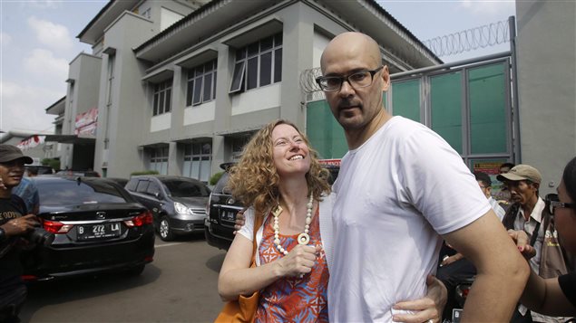  Canadian teacher Neil Bantleman, right, hugs his wife Tracy, left, after he was released from Cipinang prison in Jakarta, Indonesia on Aug.14, 2015. Foreign Affairs Minister Stephane Dion said the Canadian government *is deeply dismayed and shocked* by an Indonesian Supreme Court decision to overturn the acquittal of Canadian schoolteacher Neil Bantleman.