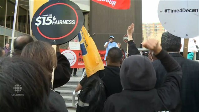 Workers at an Ontario rally in 2015 echo a movement begun in the US for a $15 minimum wage.