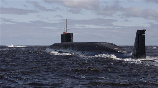  his Thursday July 2, 2009 file photo, shows a new Russian nuclear submarine, Yuri Dolgoruky, near the Sevmash factory in the northern city of Arkhangelsk, Russia. 