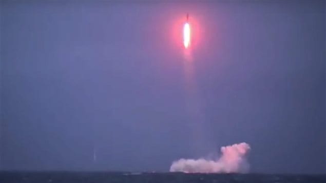  In this undated photo made from the footage taken from Russian Defense Ministry official web site and released on Saturday, Dec. 12, 2015, the Russian navy test-fires a Sineva intercontinental ballistic missile from the Verkhoturye nuclear submarine somewhere in the Barents Sea. (Russian Defense Ministry Press Service photo via AP)