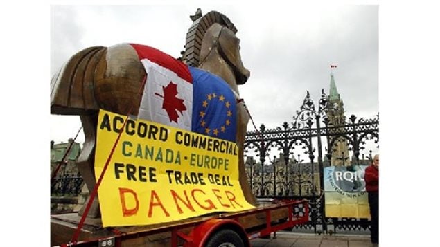 Oct 2011 Anti-CETA protestors in Ottawa saying the trade deal is a *trojan horse’ with hidden dangers.