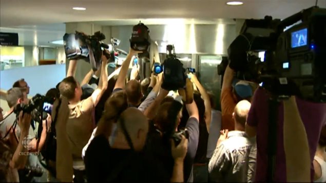 Reporters in City Hall outside an elevator where Ford has just entered, and example of the frenzy. Others on council said he was making a mockery of city hall and the position of mayor and later voted to stirp him of his powers.