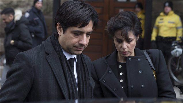  Former CBC radio host Jian Ghomeshi leaves a Toronto courthouse with his lawyer Marie Henein, right, following day six of his trial on Tuesday, Feb. 9, 2016.