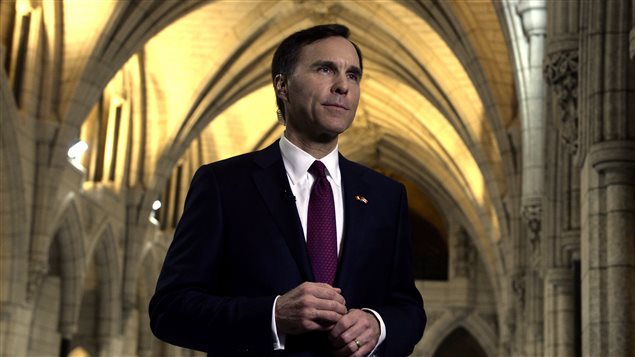  Minister of Finance Bill Morneau takes part in media interviews in the foyer of the House of Commons after delivering the federal budget on Parliament Hill in Ottawa on Tuesday, March 22, 2016. 