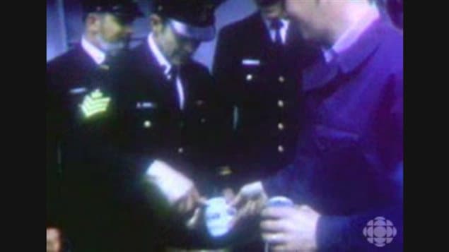 CBC film of the last day of rum issue in the Canadian navy, here a sailor recieves his 2.5 ounces aboard a Canadian ship on March 30, 1972