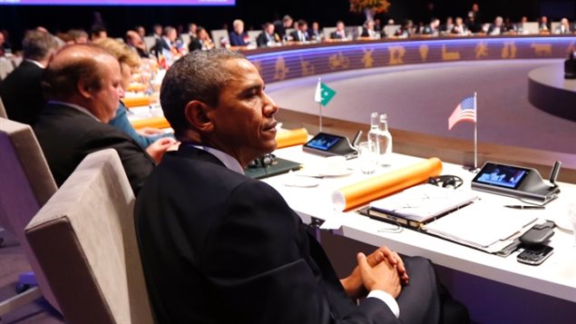Le président américain Barack Obama assiste à la séance d’ouverture du Sommet sur la sécurité nucléaire à La Haye en Mars 2014.  (Yves Herman/Reuters)