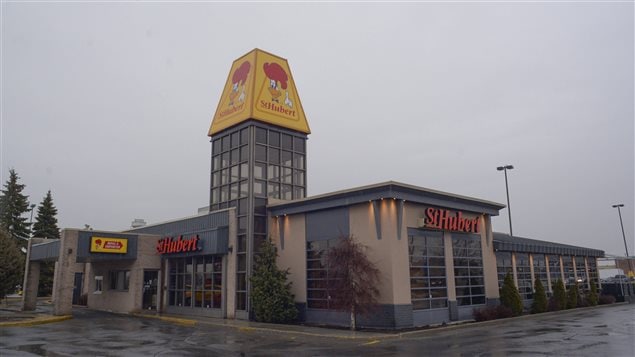  A St-Hubert restaurant is seen in Montreal Thursday, March 31, 2016. The Quebec-based St-Hubert restaurant business has agreed to be acquired by the owner of the Swiss Chalet chain for $537 million. In addition to 117 restaurants, Cara Operations Ltd. will acquire two food manufacturing plants, two distribution centres and a real estate portfolio. 