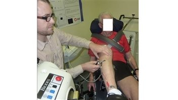 Geoff Power(now assistant professor University of Guelph, Ontario) performing an experiment to determine the number of functioning motor units in the leg muscle of a masters athlete. I am using electrical stimulation delivered to the deep fibular nerve to evoke a compound muscle action potential used in estimating the number of functioning motor units.