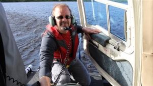 Jules Blais (PhD) collecting water from a lake in the NWT. He is a professor in the Programme for Chemical and Environmental Toxicology, Department of Biology at the University of Ottawa in Ontario