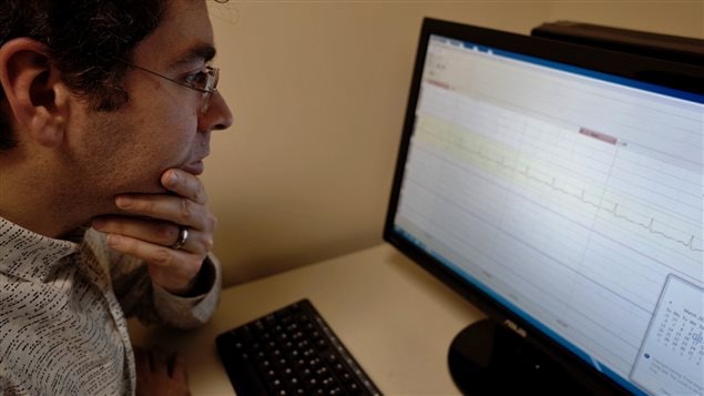 Professor Grossmann analyzing EGC data; (heart rate)