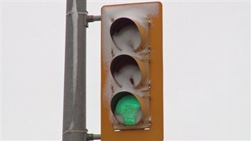 : City of Windsor officials said the incandescent bulbs they used to use would have melted snow off this LED traffic light.