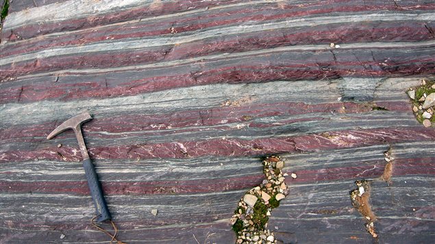  Banded iron formations, such as this one pictured in Western Australia, captured chemical features of ancient seawater when they formed in iron-rich oceans billions of years ago.
