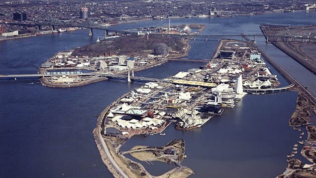 The same area (but viewed looking east this time) with the two small islands joined, and vastly extended, and an entire new *island* created along the Seaway channel. and the elevated train line to montreal