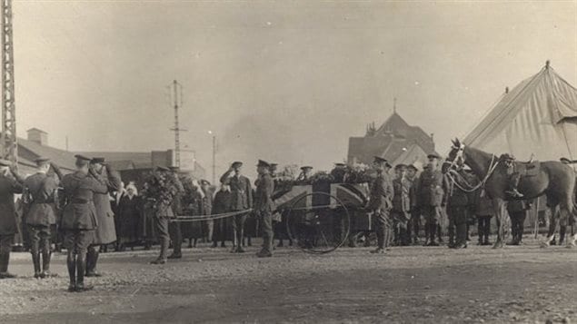 Lt Col McCrae’s funeral in 1918 showing his beloved horse “Bonfire” with his boots reversed in the stirrups. 
