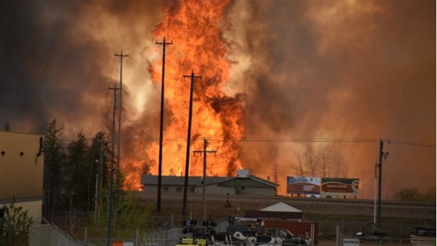 An image of the fire Tuesday as it burned into the town.