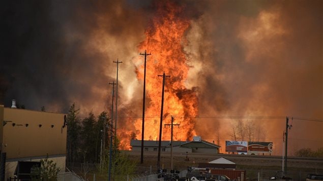 An image of the fire Tuesday as it burned into the town.