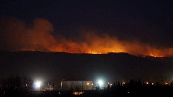 Fire burns in Taylor, British Columbia not far from an emergency response centre.