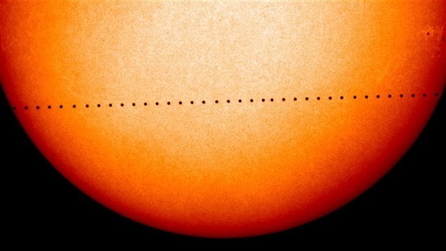 This composite image of observations by NASA and the ESA’s Solar and Heliospheric Observatory shows the path of Mercury during its November 2006 transit. On Monday, May 9, 2016, the solar system’s smallest, innermost planet will resemble a black dot as it passes in front of the Sun. NASA says the event occurs only about 13 times a century. (Solar and Heliospheric Observatory/NASA/ESA via AP)