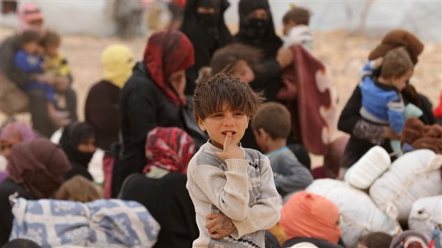 Un groupe de réfugiés syriens en Jordanie Un groupe de réfugiés syriens en Jordanie
