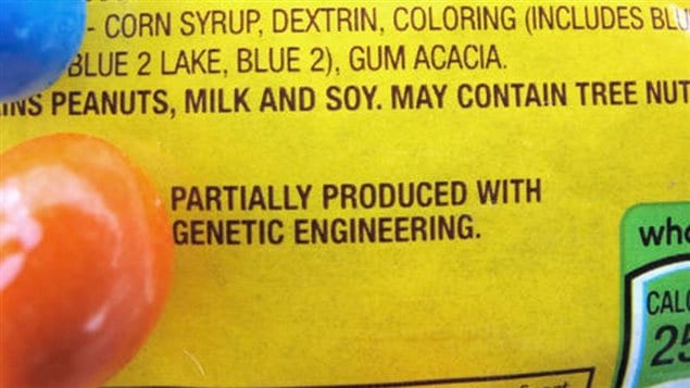Candy wrapper displays a new disclosure label showing presence of GE product