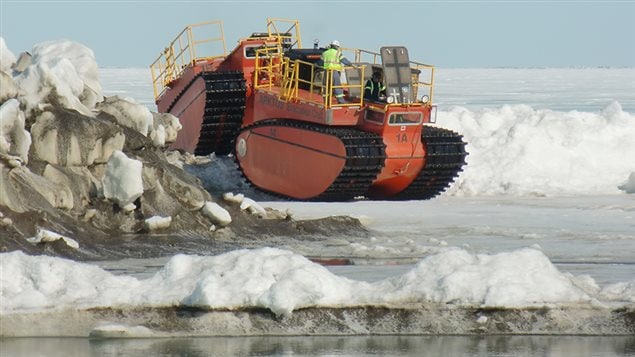 An Arktos evacuation craft negotiates an ice ridge in the Arctic. 