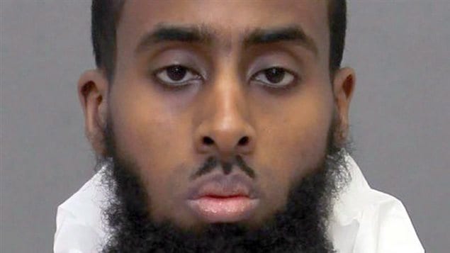  Ayanle Hassan Ali is shown in a police handout photo. The man accused of stabbing soldiers at a military recruitment centre earlier this year is now facing terror-related charges.
