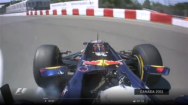 Sebastian Vettel- too fast, about to slide into the *wall of Champions* in 2011. The wall used to have a big fleur de lys and the slogan Welcome to Quebec which was what many *champion drivers saw as the crashed into it.