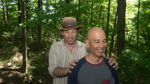Ben Porchuk, left, led a session of forest therapy at a park in Toronto today. He is head of Canada’s Association of Nature and Forest Therapy Guides and Programs.