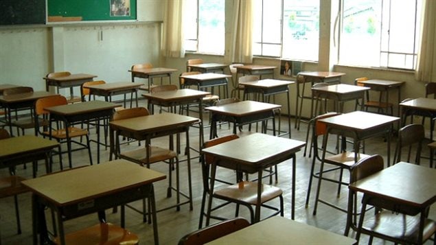 Une salle de classe. Une salle de classe.