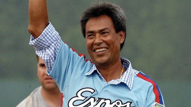 Dennis Martinez was so popular in Montreal that he headlined a Montreal film festival last summer entitled "Match Parfait: Le Baseball Au Cinéma” (Perfect Game, Baseball in Cinema). We see the Martinez in salt-and-pepper hair waving with his right hand. A giant smile graces his face above a powder blue jersey with the word "Expos" written in script across the chest.