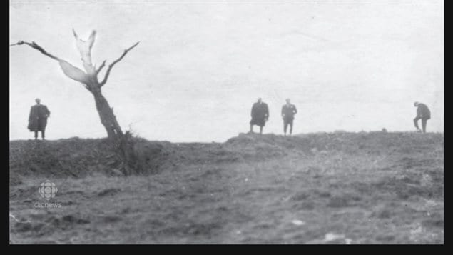 Presumably a postwar photo showing The Danger Tree, a landmark about halfway between the Newfoundland and German trenchs and used by the Germans as a sighting in range finder. Tragically it was also a place where the barbed wire had been cut and one of the narrow ways through the wire funneling the soldiers who were easy targets in the clear valley in broad daylight.