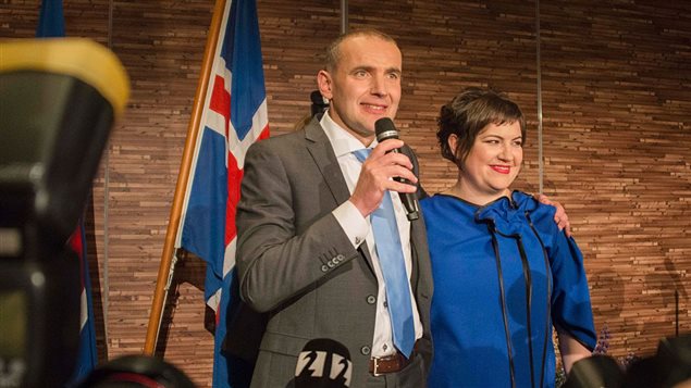 Independant presidential candidate Gudni Johannesson (L) speaks next to his wife Eliza Reid at an election party in Reykjavik, on June 25, 2016. Political newcomer Gudni Johannesson claimed victory in Iceland’s presidential election after riding a wave of anti-establishment sentiment, though the vote was eclipsed by the country’s eagerly-anticipated and historic Euro football match.