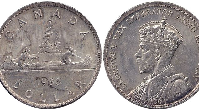 The original one-dollar coin was created in 1935 to celebrate the 25 years of King George V’s reign. The voyageur was the most commonly minted reverse image though special editions were minted over the decades. Originally mostly silver, the silver content was reduced over the years until the coin was replaced by the ’new’ gold-coloured coin in 1987. Originally to use the ’voyageur’ design, the dies were strangely ’lost’ in transit leading to the loon image and name ’loonie’