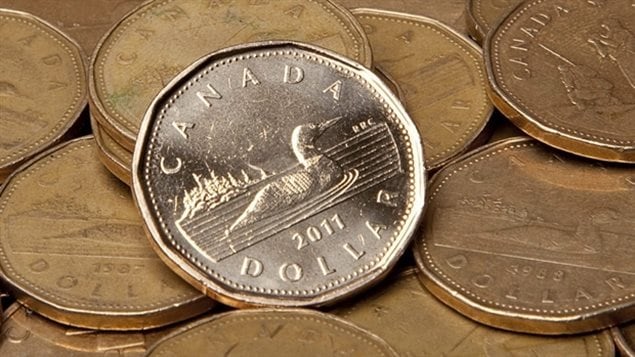 The Canadian one dollar ’loonie’. While this is the most commonly distributed image, as with all coins the image has changed for special editions. including special designs for a Confederation anniversary, Remembrance Day,  Peacekeeping, Olympics, and others