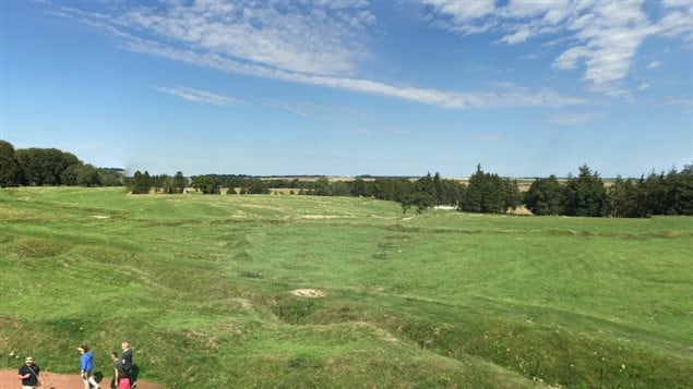 The preserved battlefield. The Newfoundlanders had to advance from the rear over open ground just to reach the British front tranch about halfway across this field. then over more open ground toward the German wire and trnaches in the distant trees.