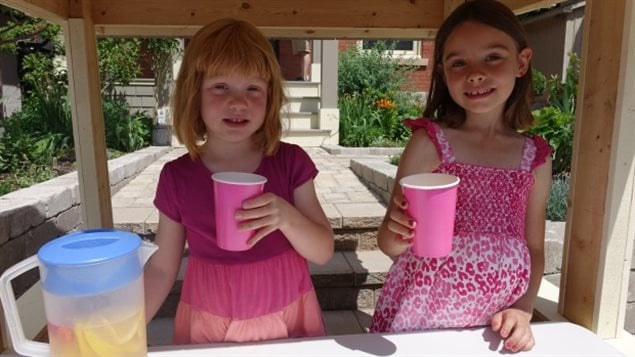  Adela Andrews (left) and her older sister Eliza (right) were selling lemonade along Ottawa’s Colonel By Drive until the National Capital Commission shut them down for failing to have a permit.