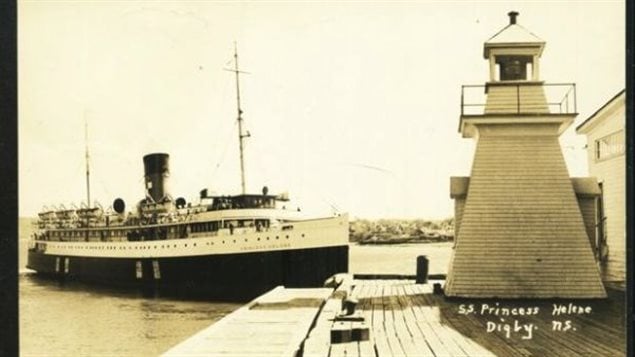 SS Princesse Helene docking at Digby, showing the lighthouse. Date unknown but would have to be prior to 1963 when the ship was sold to Greece.