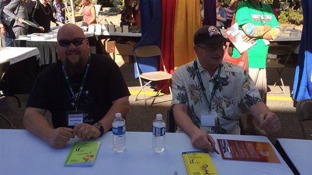 Cartoonist/illustrator Jason Sylvestre (left) and writer Carson Demmans at a book signing for the bestselling *You might be from Saskatchewan if..* books vol-1 and 2