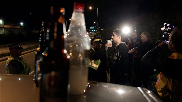 Finding open bottles of alcohol gave police the authority to test the driver for alcohol levels in this incident in September 2010 in Surrey, British Columbia.