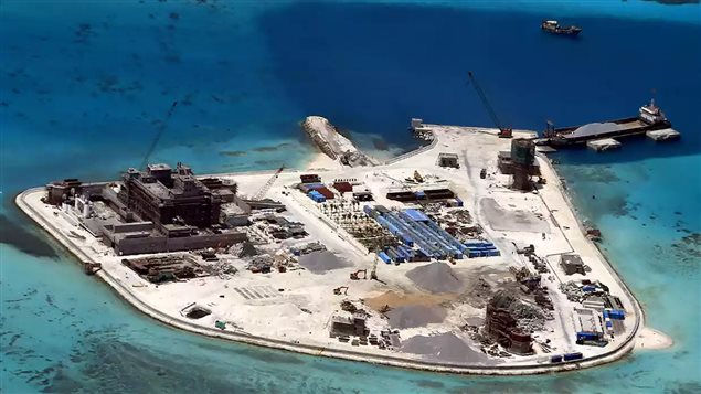 A handout picture made available by the Philippine military on 20 April 2015 shows Chinese construction at Mabini (Johnson) Reef in the disputed Spratley Islands in the south China Sea