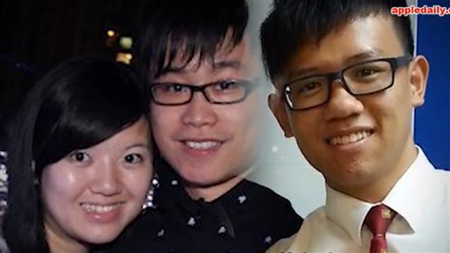 31岁的欧阳（中）和他的女友被砍伤，女友的弟弟（右）幸免。
