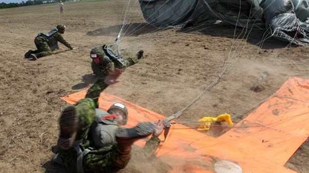 Canadian paratroopers land on the “X” during Leapfest 2015 in West Kingston, Rhode Island.