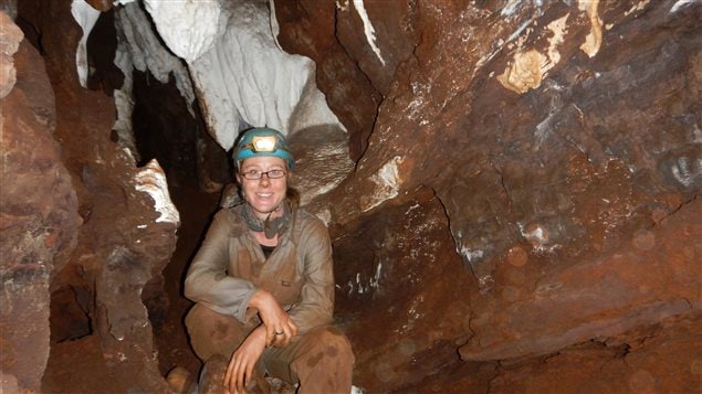Marina Elliott navigates narrow passages and chutes to get to the remains of a mysterious species related to humans in South Africa’s Rising Star cave complex.