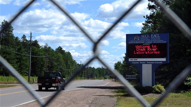 A sign greets people at the entrance to the Chalk River nuclear laboratories on July 9, 2012. Nuclear scientists are negotiating a new collective agreement.